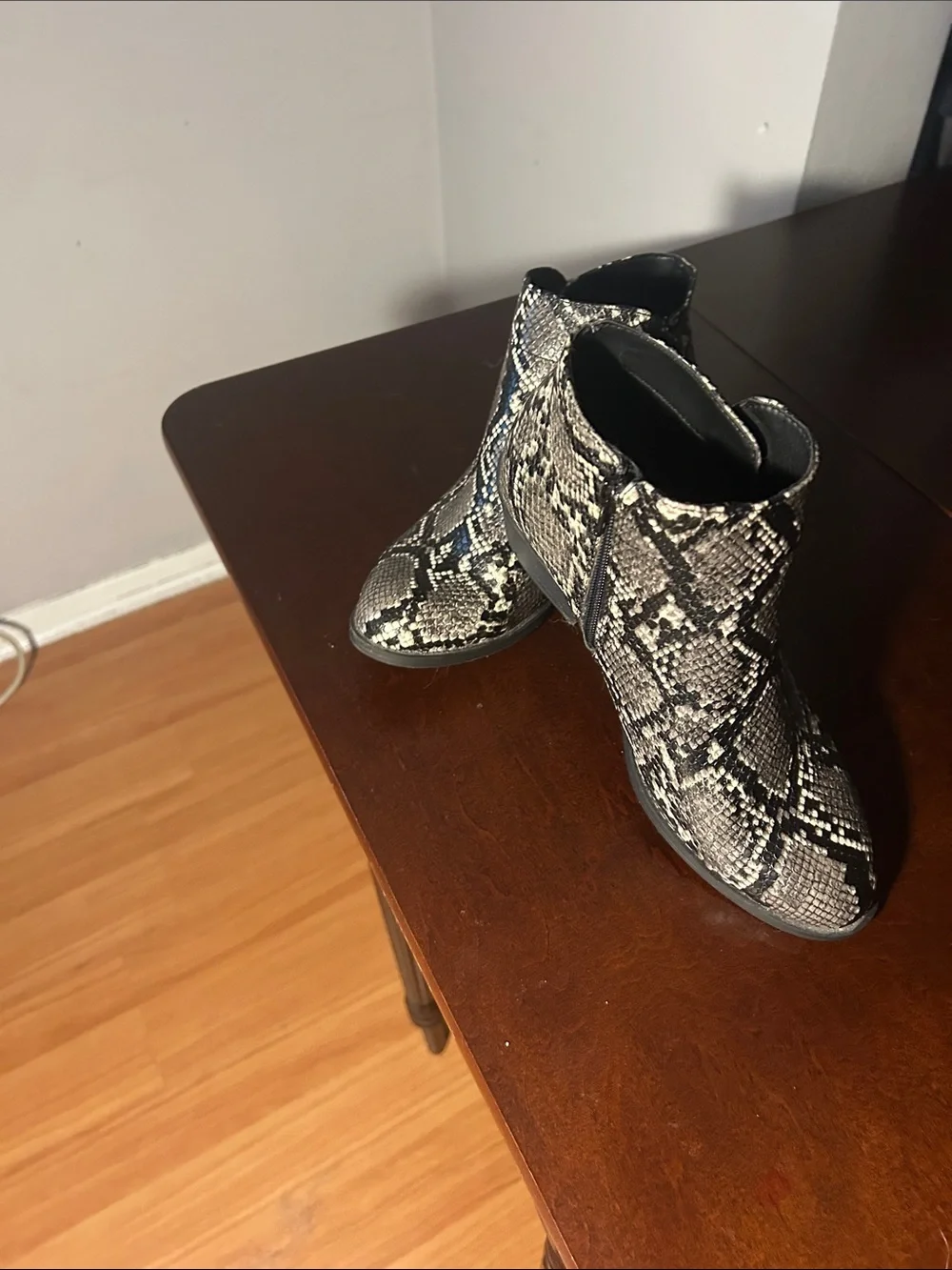 Arizona Jean Company Snake-Print Ankle Booties in Black and Cream